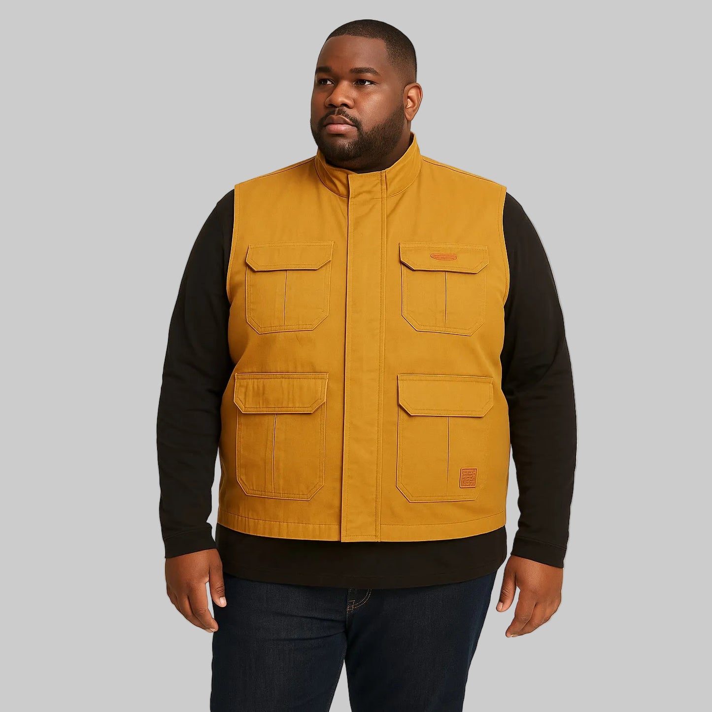 Men’s mustard twill cotton sleeveless jacket, lightweight layering vest, front studio view