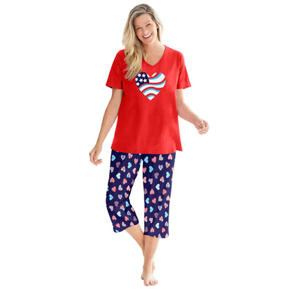 Women’s Navy Americana Heart two piece pajama set with V-neck tunic top and matching capri bottoms, made from breathable cotton.