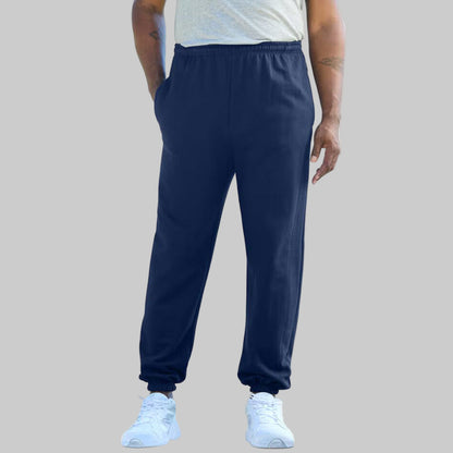 Navy blue fleece closed-bottom sweatpants for plus-size men with elastic cuffs and pockets on a clean studio background.