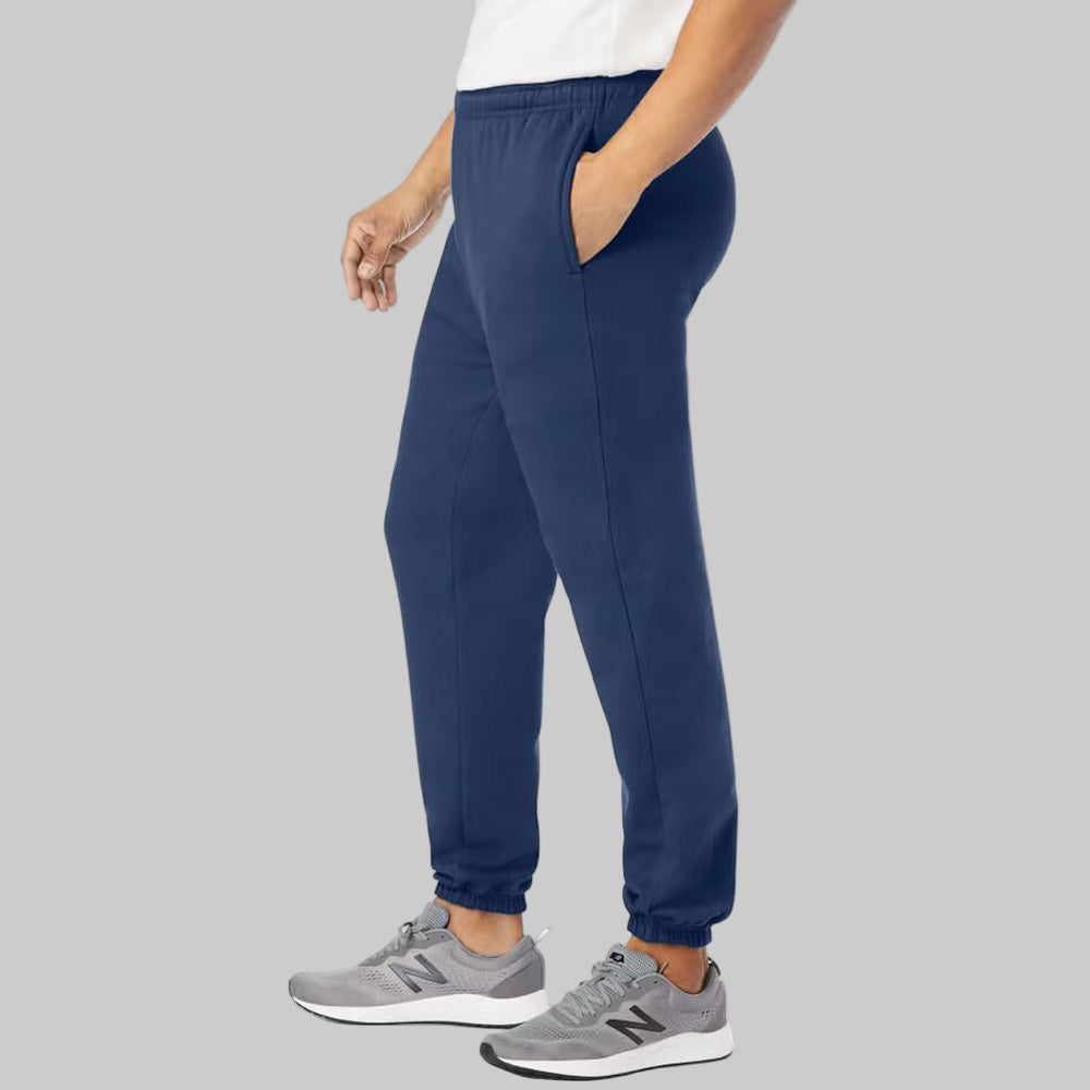 Navy blue fleece closed-bottom sweatpants for plus-size men with elastic cuffs and pockets on a clean studio background.
