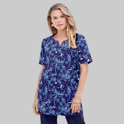 Plus-size soft knit tunic with a relaxed fit, 32” length, and breathable cotton/poly fabric. A timeless and comfortable everyday classic.