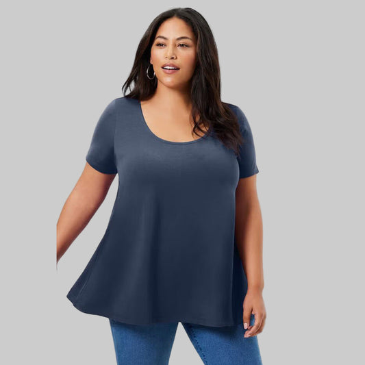 Plus size woman wearing a Navy Short Sleeve Cotton Tee with a relaxed fit, short sleeves, and breathable cotton-spandex fabric.