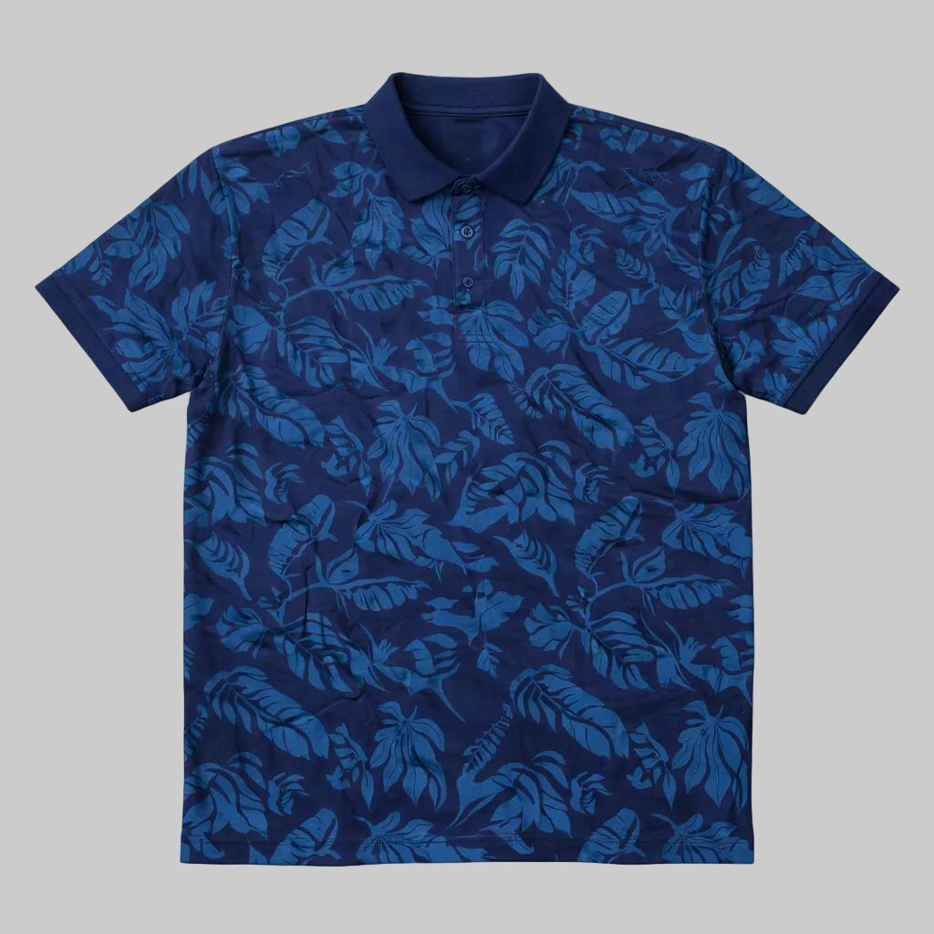 Navy polo shirt with all-over tropical leaf print and short sleeves