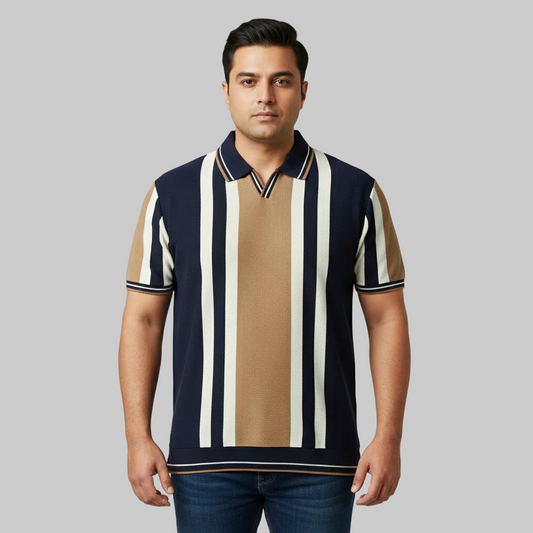 Navy blue and camel vertical stripe polo shirt worn by a male model, featuring a classic collar and short sleeves on a studio background