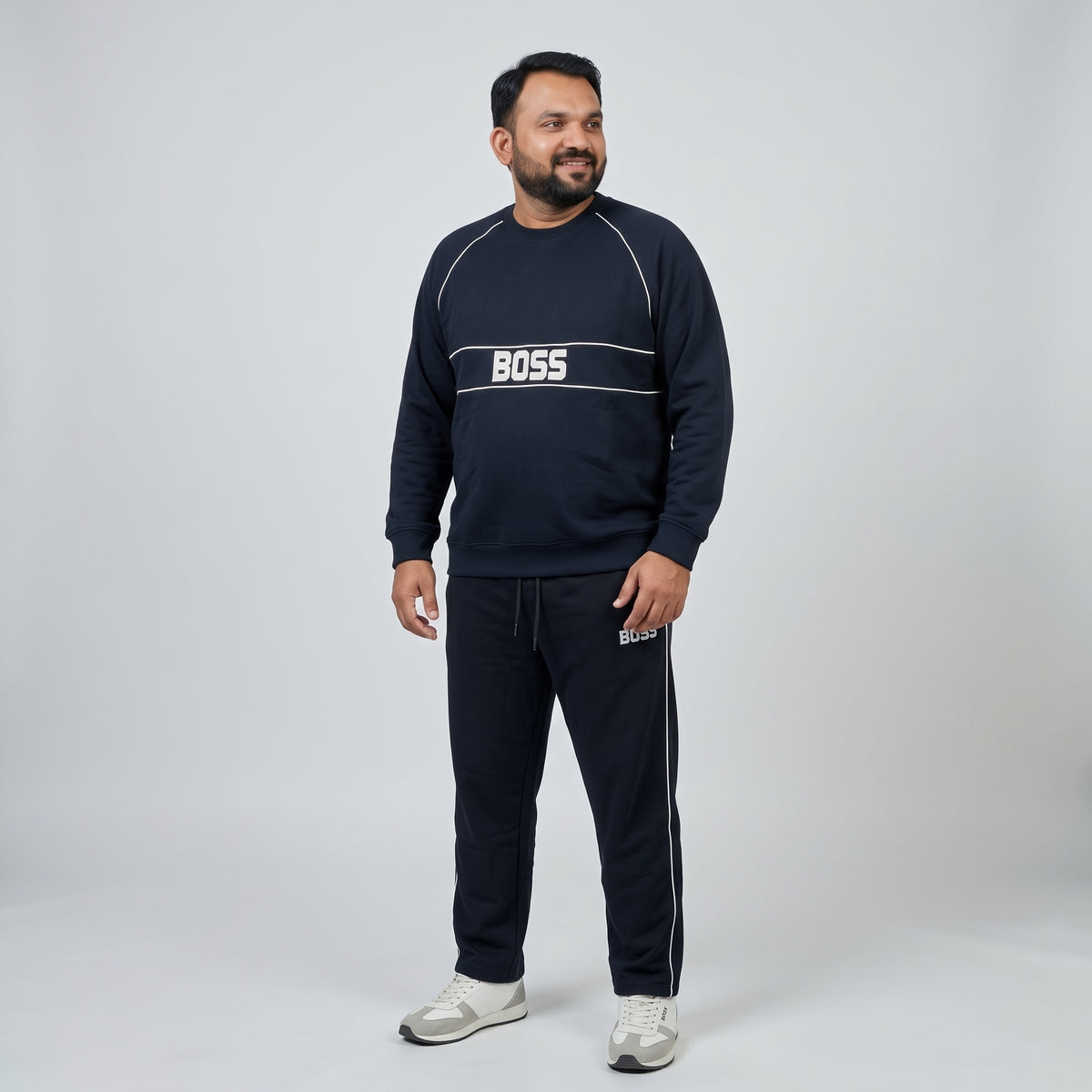 Navy Blue Embroidered Fleece Co-ord Set featuring a stylish embroidered top and matching trousers in soft fleece fabric.