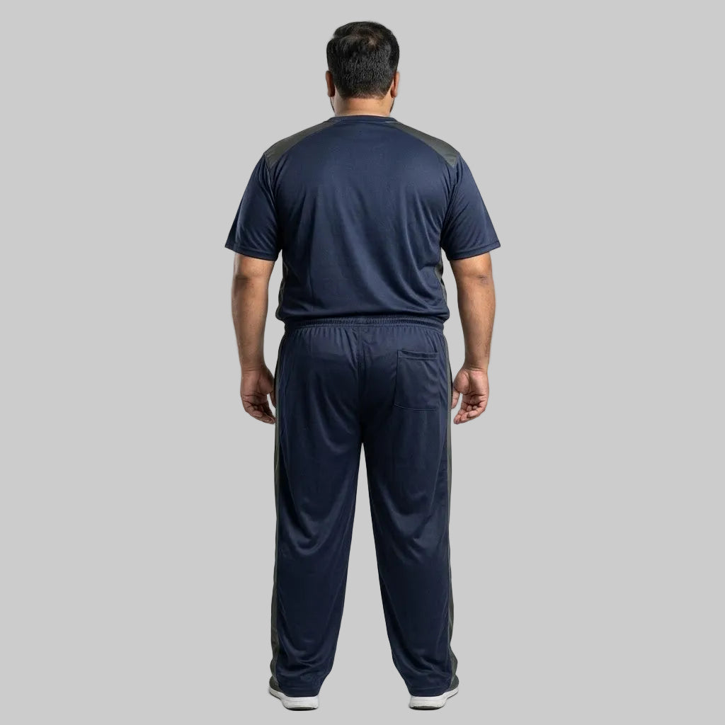 Men's Navy Blue & Grey Polyester Co-Ord Set featuring a crewneck T-shirt and matching trousers made from breathable mesh polyester fabric with grey contrast panels.