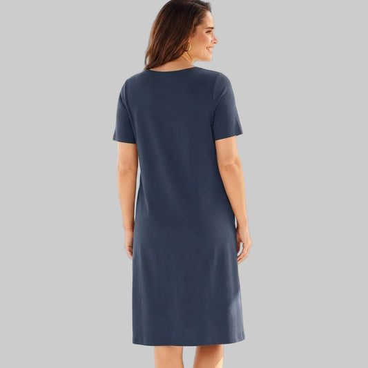 Navy Blue Short-Sleeve Crewneck Tee Dress made from soft jersey cotton fabric, front view on a white background, ideal for casual everyday wear.