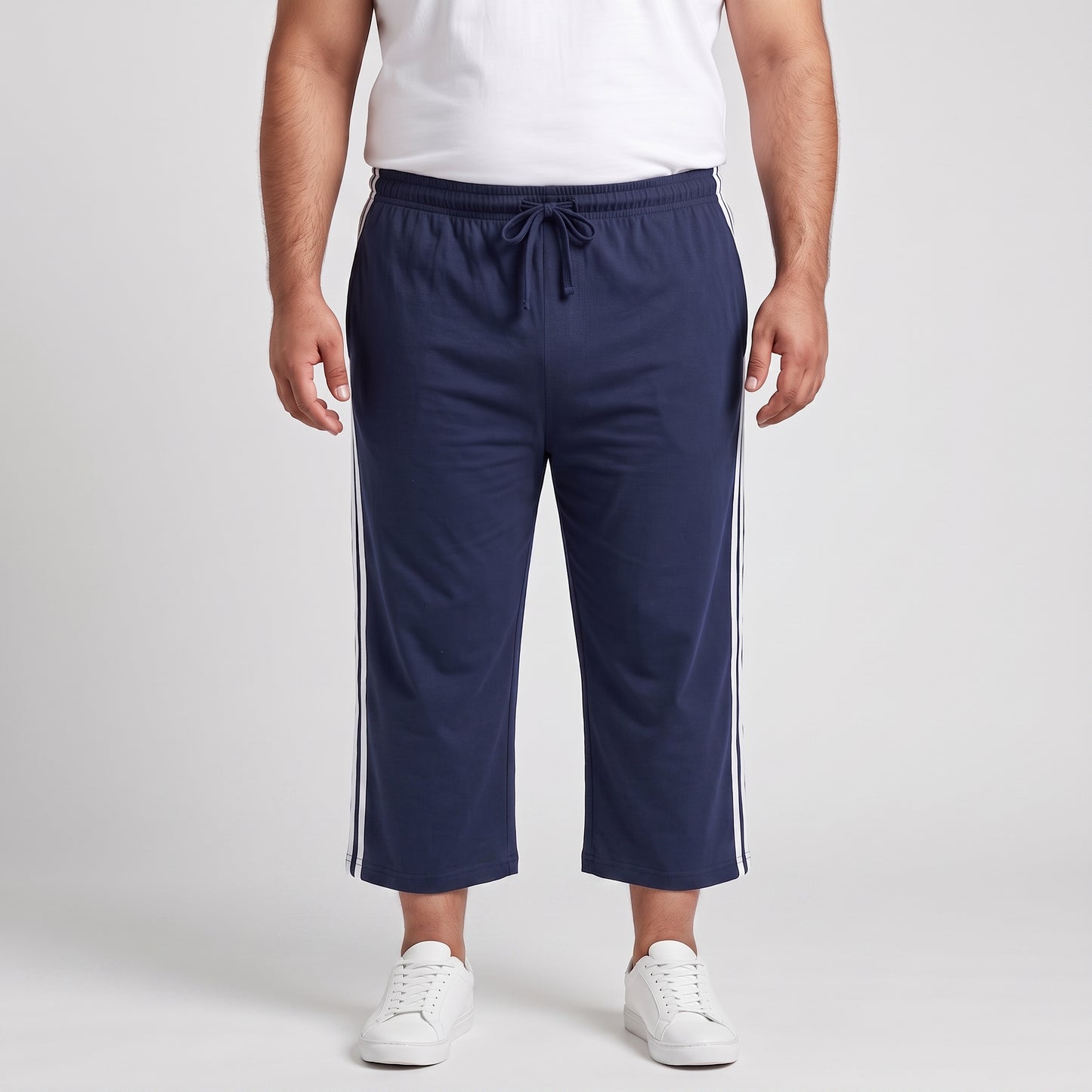 Navy blue and white side stripe 3 quarter shorts made from jersey cotton 
