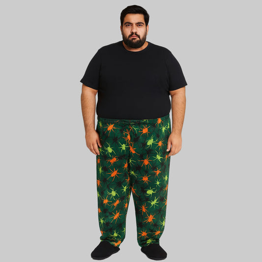 Plus-size Neon Spiders flannel pajama pants with colorful novelty print, elastic waistband, drawstring, and side pockets.