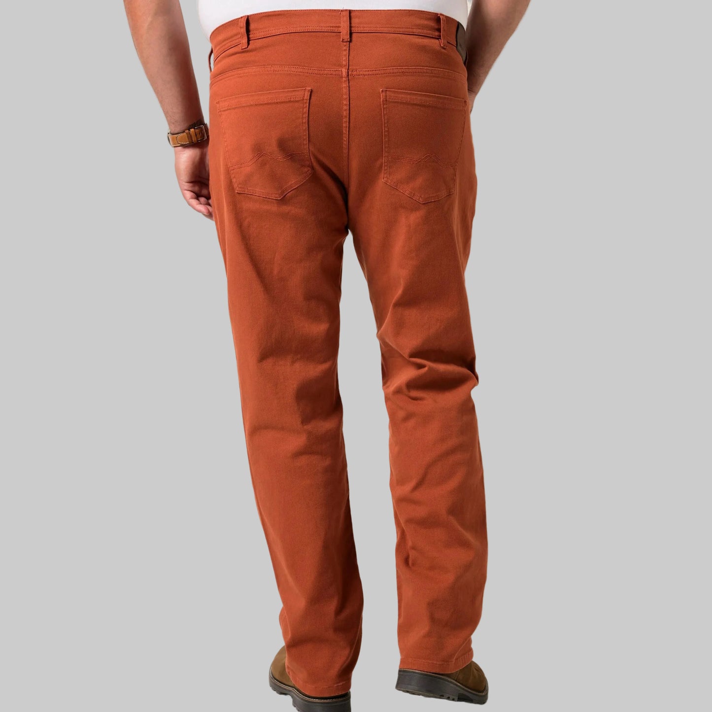 Ochre brown tapered fit jeans in cotton stretch fabric with normal rise, side and back pockets, and a clean everyday finish.