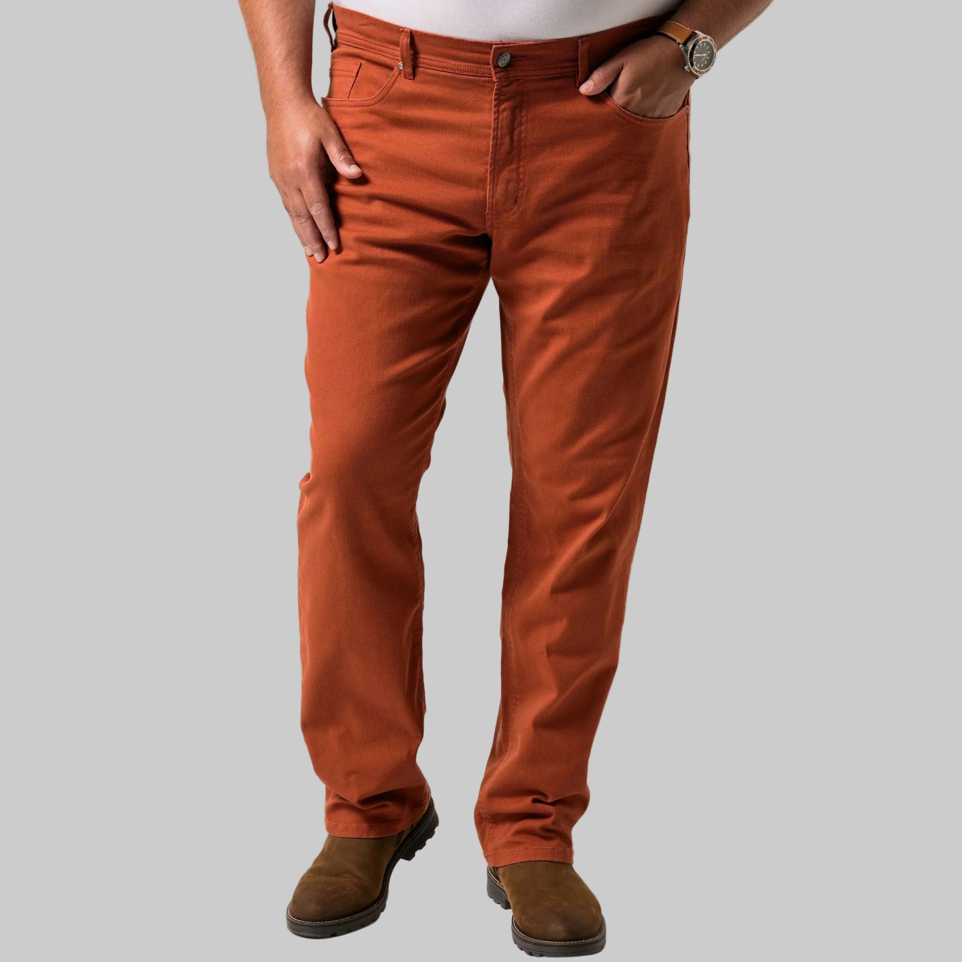Ochre brown tapered fit jeans in cotton stretch fabric with normal rise, side and back pockets, and a clean everyday finish.