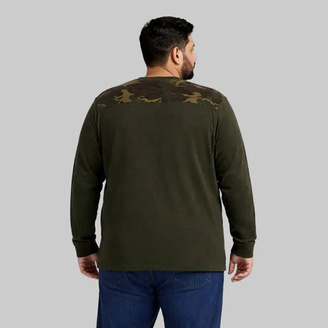 Olive green waffle-knit thermal shirt with camo shoulder panels worn by a plus-size model