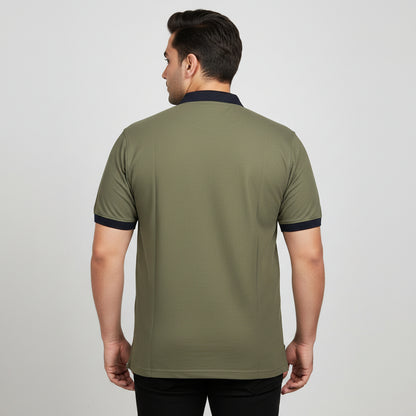 Alt Text: Men's olive green short-sleeve polo shirt featuring a contrast black collar and sleeve cuffs, laid flat on a light background.