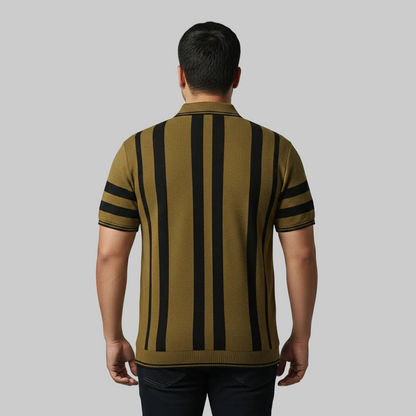 Olive mustard and black vertical stripe polo shirt worn by a male model, featuring a classic collar and short sleeves on a studio background
