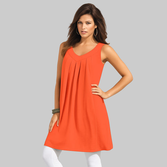 Plus-size woman wearing an orange pleated sleeveless tunic tank with V-back design on a white background.