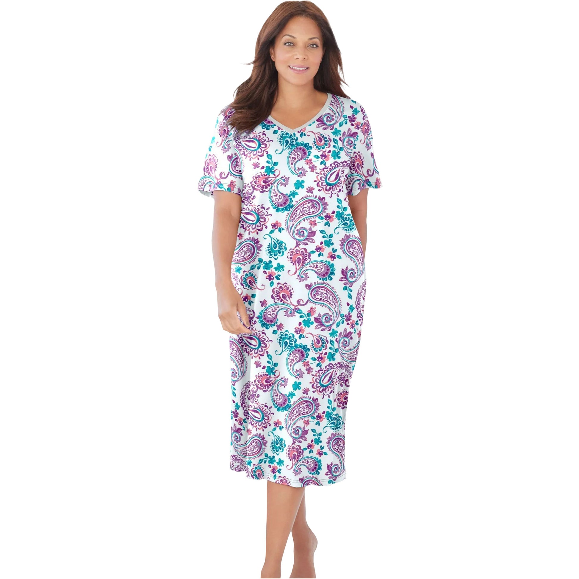 Woman in white sleepshirt with orchid paisley floral print and short sleeves