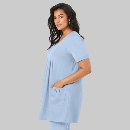 Pale Blue Two Pocket Soft Knit Tunic with short sleeves, scoop neckline, and a relaxed fit for everyday comfort and style.