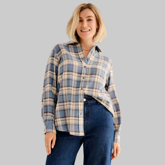 Pale indigo plaid cotton flannel shirt with button front, long sleeves, and shirttail hem,
