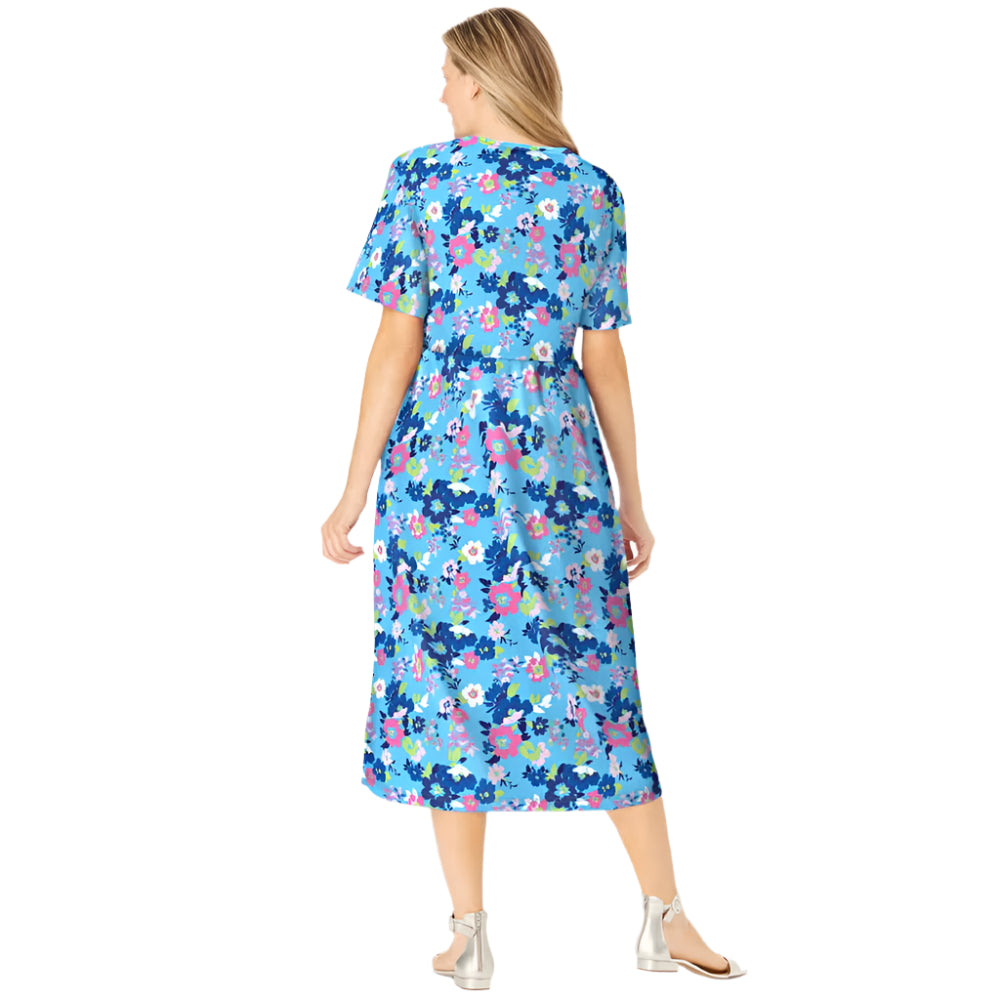 Woman wearing Paradise Blue floral garden print button-front dress with gathered waist

