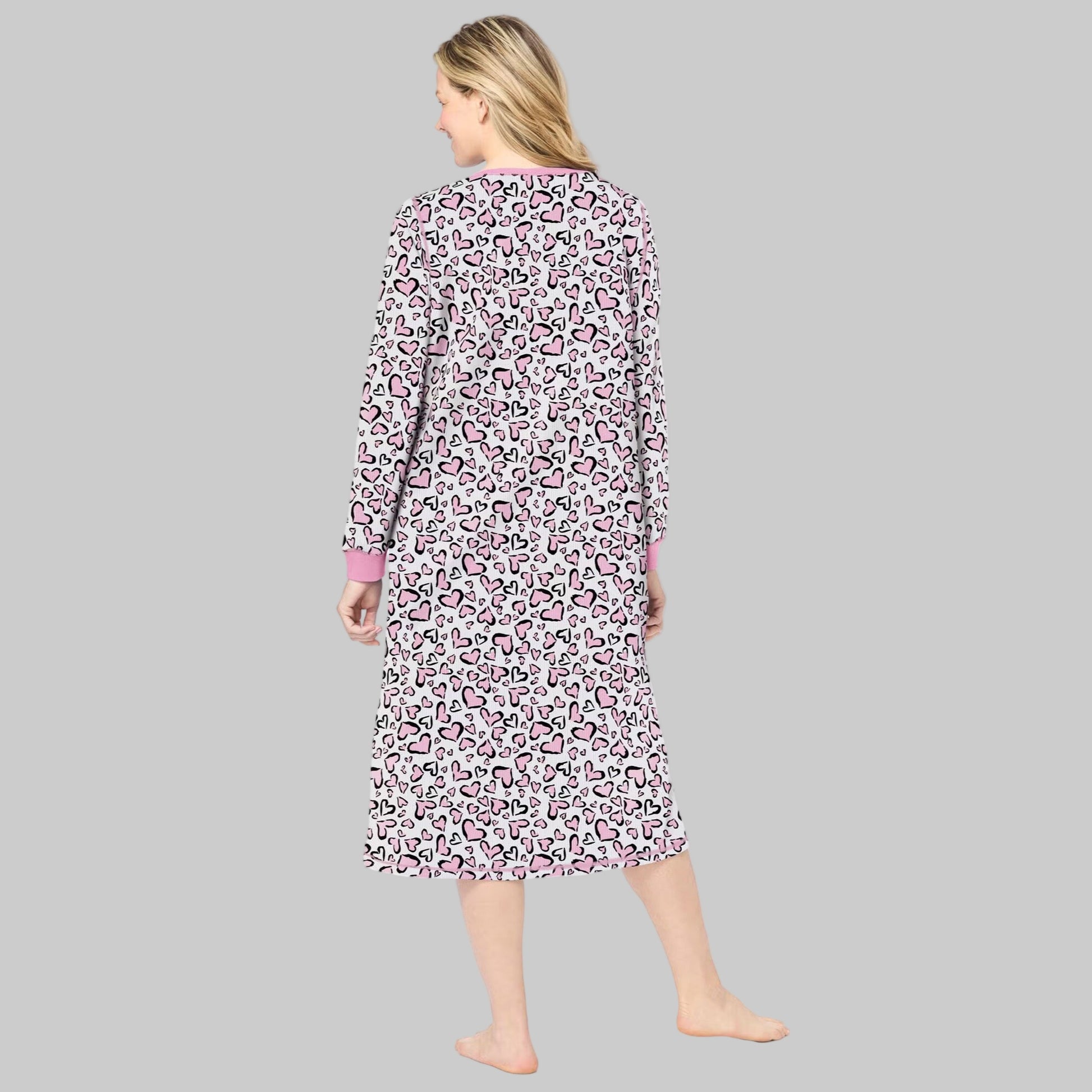 Women’s Pink Animal Hearts Thermal Henley Nightgown with long sleeves, Henley snap neckline, side slits, and calf-skimming 46" length in cotton/poly fabric.