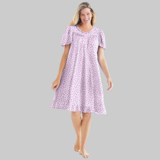 Pink ditsy floral short cotton nightgown with flutter sleeves, ruffled hem, and pintuck details — soft, breathable sleepwear for women.