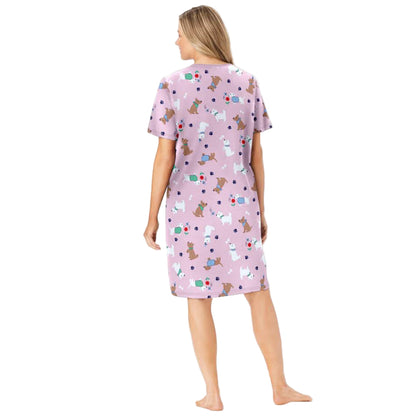 Pink Spring Delight Short Print Sleepshirt with playful prints, ribbed V-neck, short sleeves, and A-line silhouette – 40-inch women’s cotton sleepwear.