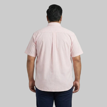 Men's pink casual short sleeve button-up shirt with a classic spread collar and front button closure laid flat on a white background.