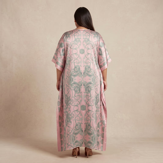 Pink and sage green damask print maxi kaftan made from lightweight polyester with an elegant pattern and flowing silhouette.