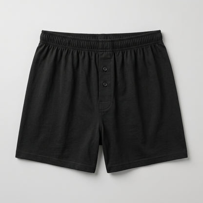 Plus Size Black men's shorts with an elastic waistband and a two-button placket, shown flat on a light gray background.