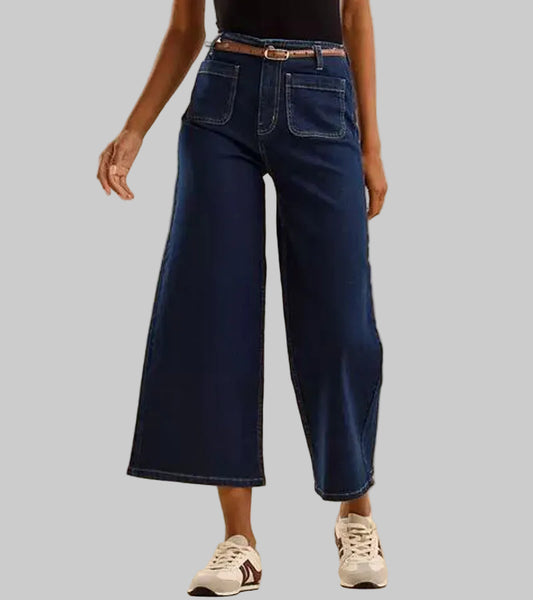 Plus size woman wearing cropped wide leg dark blue denim jeans in a casual look