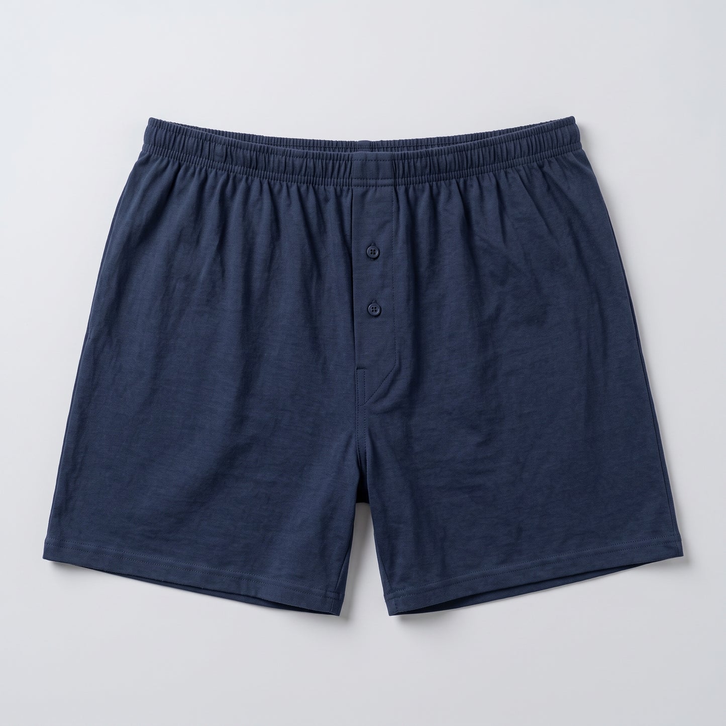 A pair of men's navy blue shorts with an elastic waistband and a Two-button placket, laid flat on a light gray background.