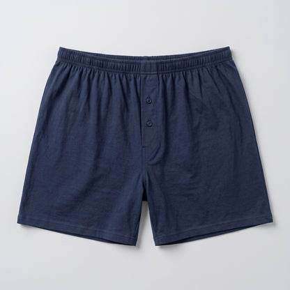 A pair of men's navy blue shorts with an elastic waistband and a Two-button placket, laid flat on a light gray background.