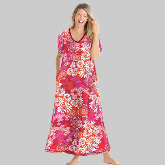 Women’s Pomegranate Floral Long T-Shirt Lounger with V-neck, short sleeves, trapeze fit, maxi length, side pockets, and side hem slits in cotton/poly blend.