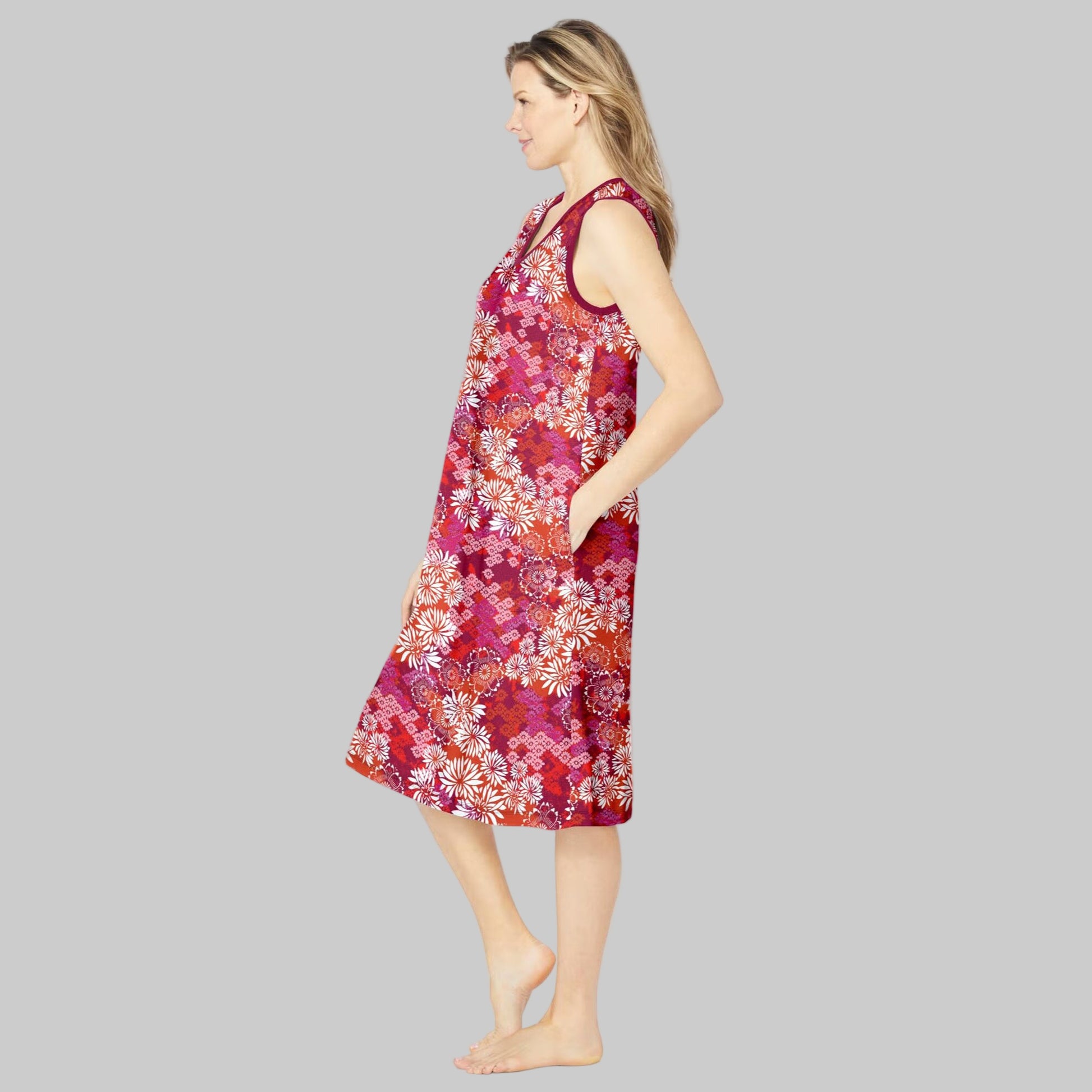 Women’s Pomegranate Floral V-Neck Sleeveless Lounger with side pockets and shirttail hem.