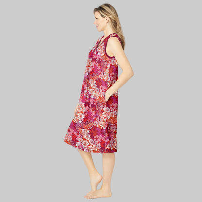 Women’s Pomegranate Floral V-Neck Sleeveless Lounger with side pockets and shirttail hem.