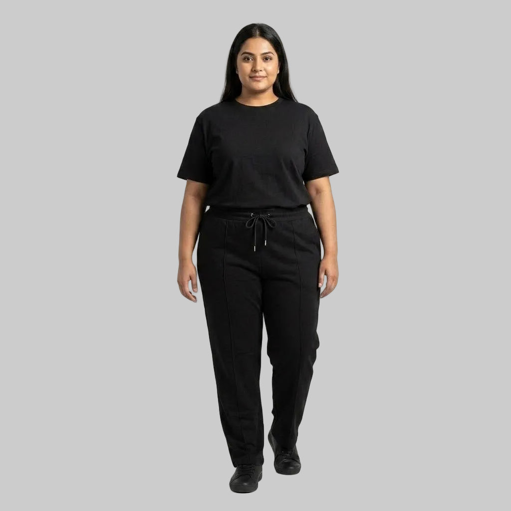 Premium black men's cotton jersey co-ord set featuring a matching short-sleeve T-shirt and comfortable bottoms for casual everyday wear.