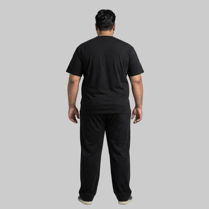 Premium black men's cotton jersey co-ord set featuring a matching short-sleeve T-shirt and comfortable bottoms for casual everyday wear.