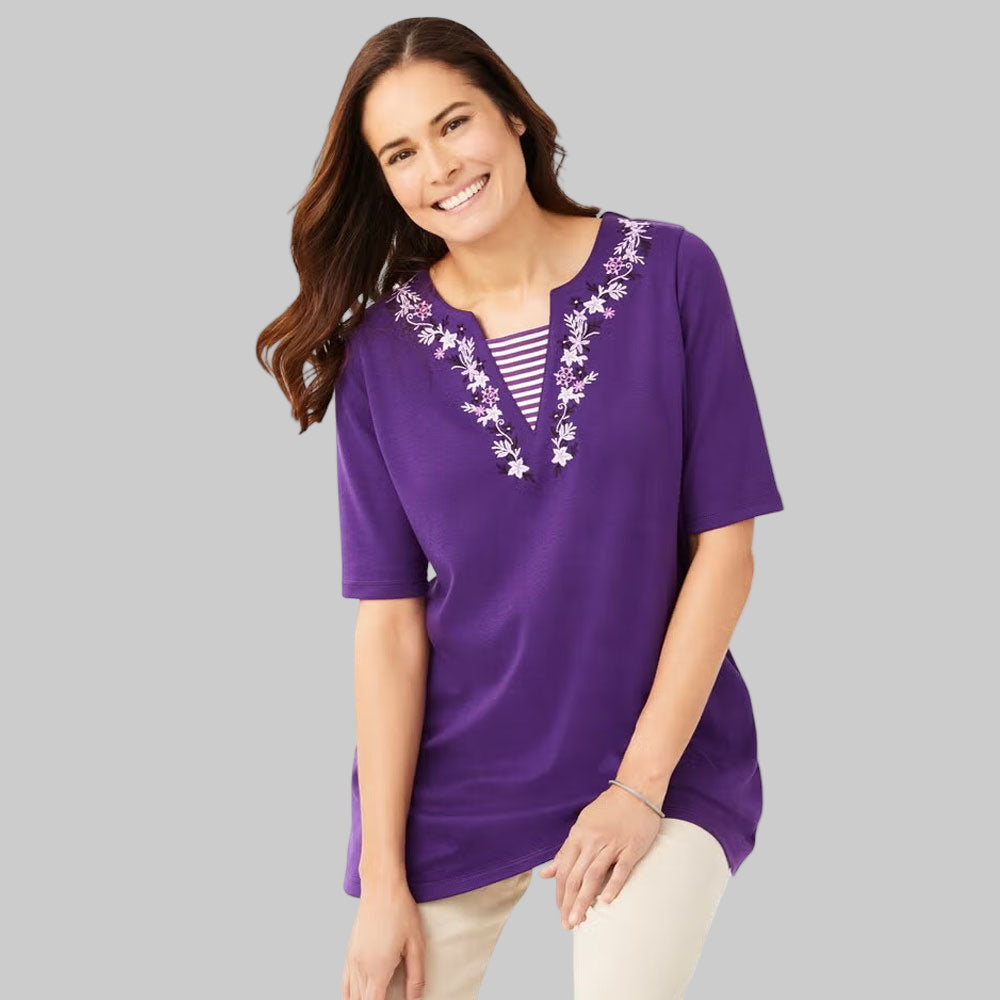 This plus-size 2-in-1 tunic makes layering effortless with a striped contrast inset & embroidered neckline. Relaxed fit, elbow sleeves & tunic length for comfort.