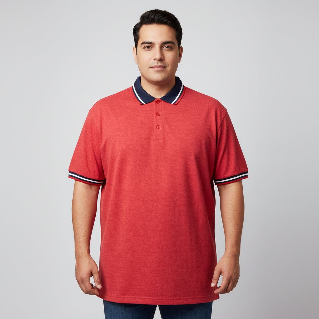 Red polo shirt with white collar on a white surface