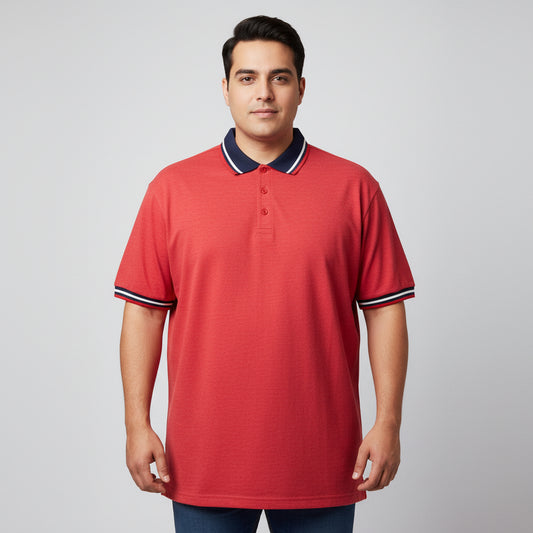 Red polo shirt with white collar on a white surface