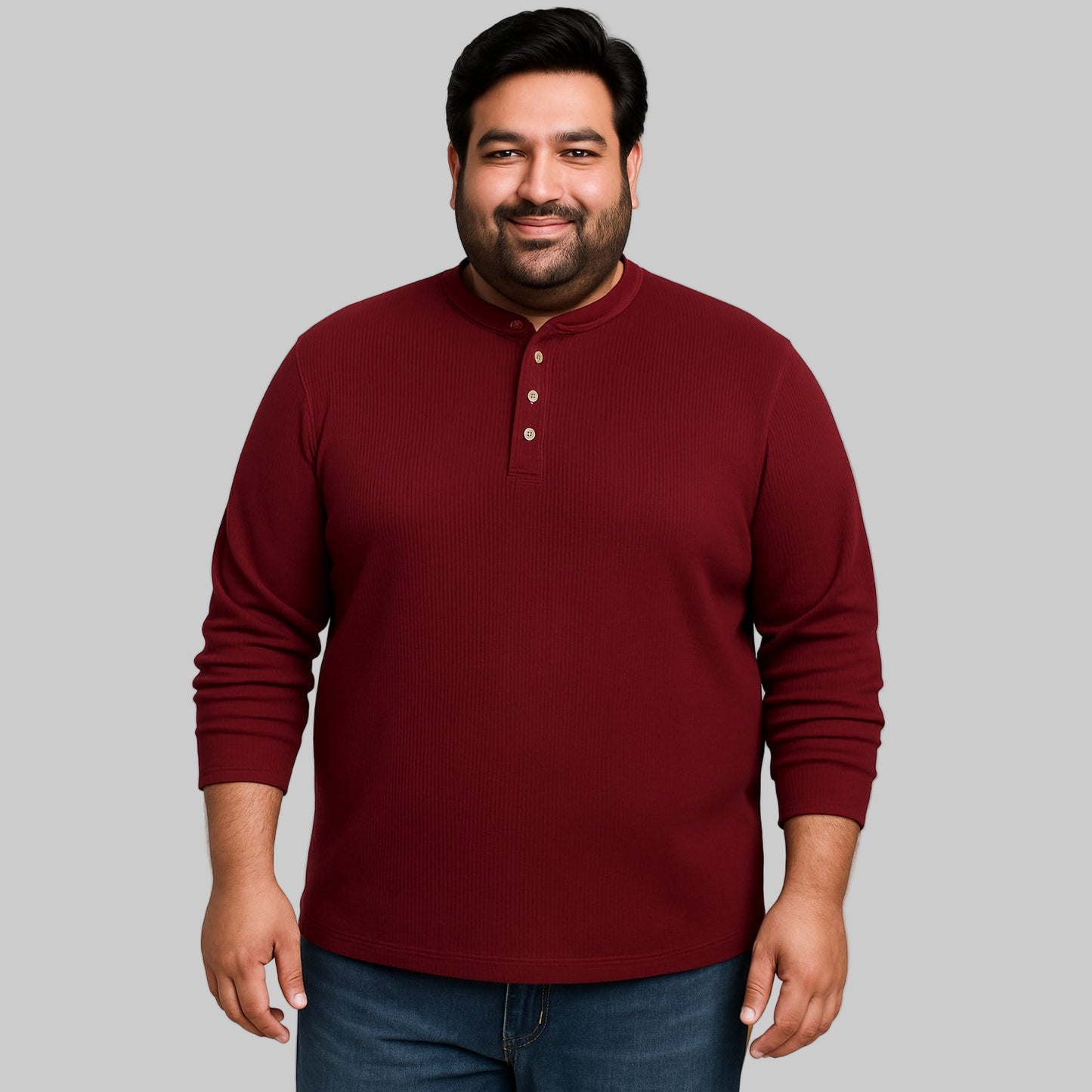 Model wearing rich burgundy waffle-knit thermal Henley tee with ribbed cuffs and classic five-button placket.