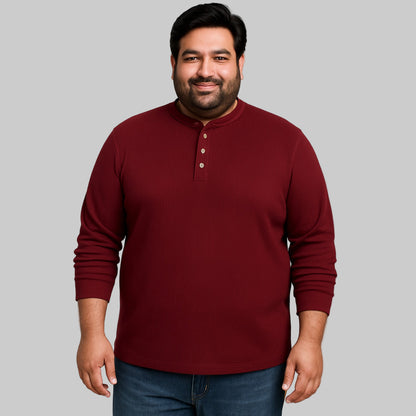 Model wearing rich burgundy waffle-knit thermal Henley tee with ribbed cuffs and classic five-button placket.