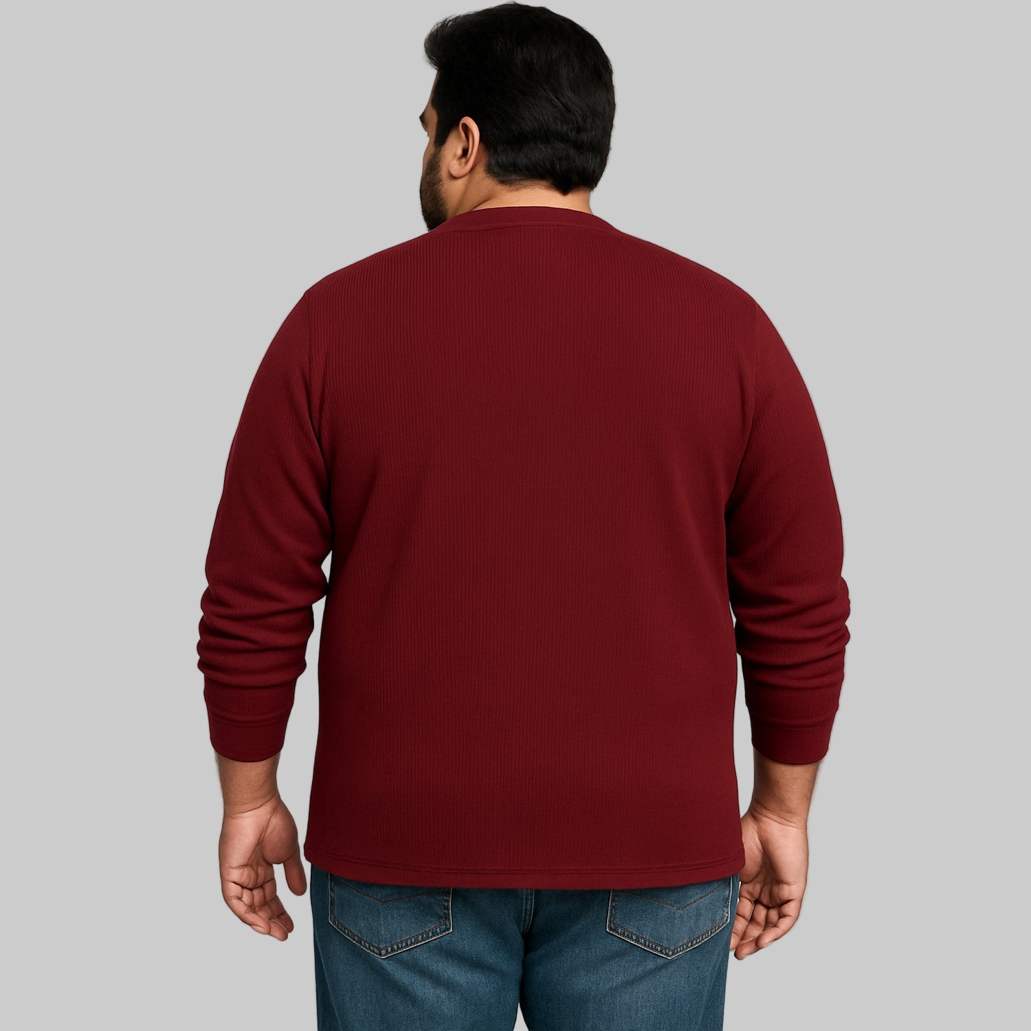Model wearing rich burgundy waffle-knit thermal Henley tee with ribbed cuffs and classic five-button placket.
