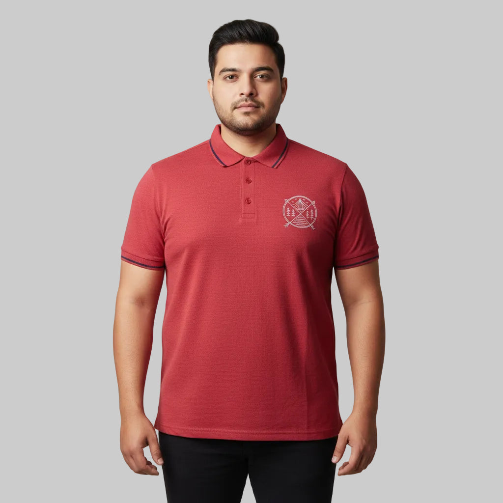 Rust red plus size polo shirt with contrast collar tipping and chest print laid flat showing front design and sleeve detail