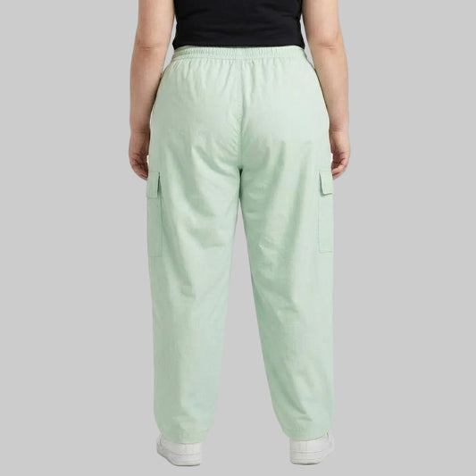 Seafoam Green Cargo Baggy Trousers in premium 98% cotton, 2% elastane twill dyed fabric featuring a relaxed baggy fit, elastic waistband, and utility cargo pockets.