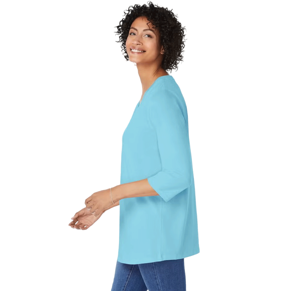 Seamist blue V-neck tunic with three-quarter sleeves, made from soft knit fabric, shown on a plus-size mannequin with a relaxed silhouette.