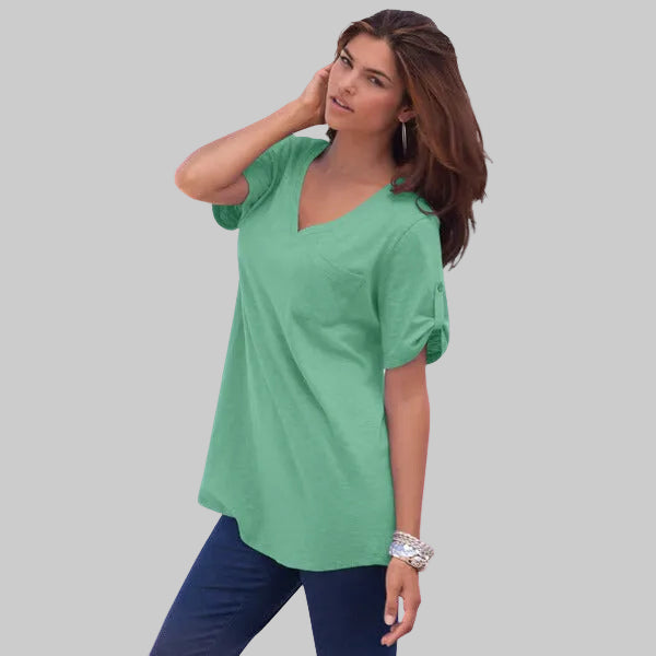 Plus-size woman wearing soft jade V-neck slub tunic – PluSoft Jade V-Neck Boyfriend Slub Tunic made from soft cotton-blend fabric with a relaxed fit and stylish slub texturesSize.pk