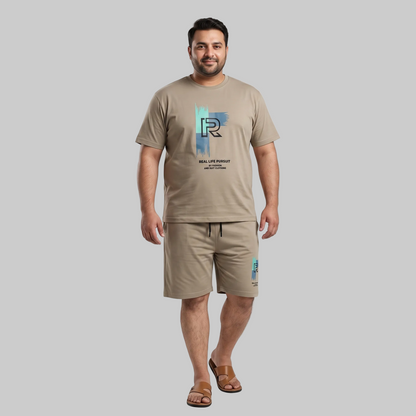 Men's Stone Beige Real Life Pursuit Graphic Interlock T-Shirt and Shorts Co-Ord Set with matching graphic print.