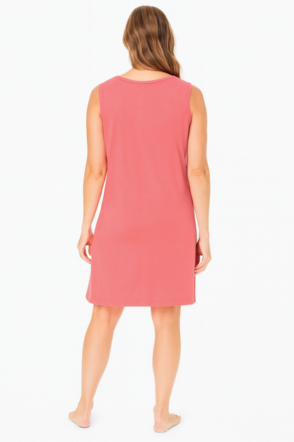 "Women’s sleeveless sleepshirt in sweet coral shade with playful prints, 40-inch length, soft cotton knit fabric, and relaxed fit for cozy sleepwear