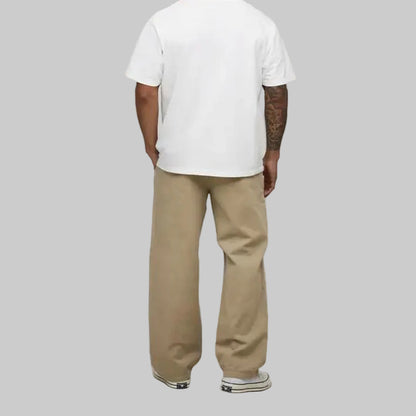 Men’s taupe wide-leg jeans with relaxed fit and neutral tone